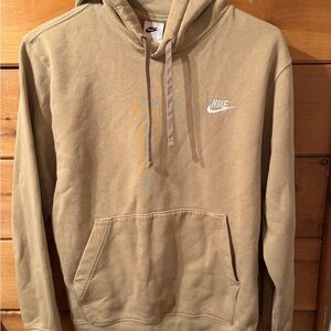 Nike sweatshirt. Size: Medium. Pre-owned. Good condition. Tan in color. Hooded.